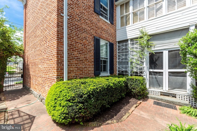 140 Pennsylvania Ave, Westminster, MD 21157 - view of property exterior featuring brick siding, entry steps, and a gate