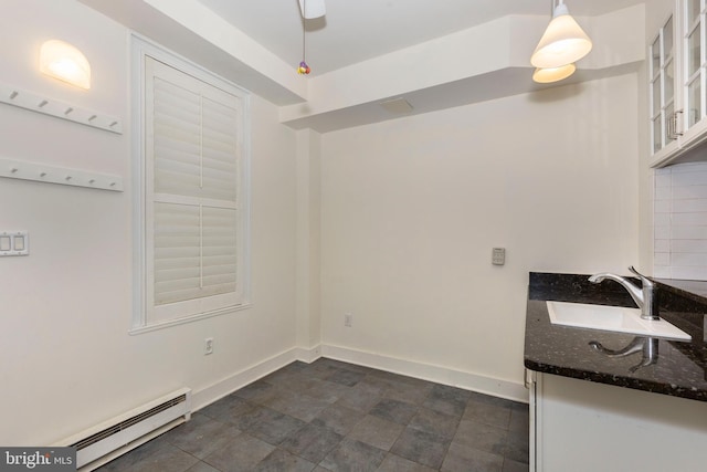 140 Pennsylvania Ave, Westminster, MD 21157 - unfurnished dining area with a baseboard heating unit and a sink