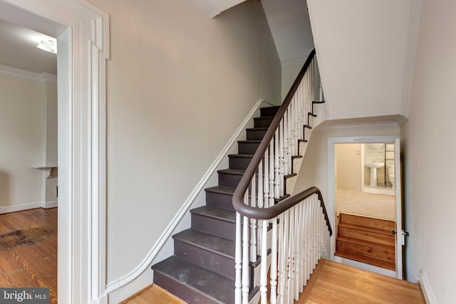 140 Pennsylvania Ave, Westminster, MD 21157 - staircase with wood finished floors and crown molding