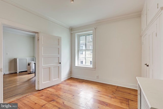 140 Pennsylvania Ave, Westminster, MD 21157 - unfurnished bedroom with ornamental molding and light wood finished floors