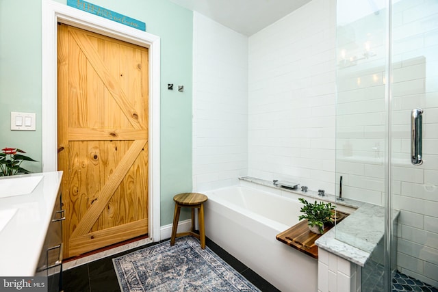 877 Salford Station Rd, Schwenksville, PA 19473 - bathroom with tiled shower and a tub to relax in