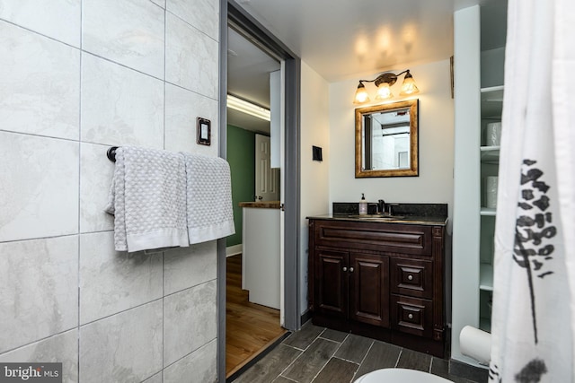 877 Salford Station Rd, Schwenksville, PA 19473 - bathroom with wood tiled floors and vanity