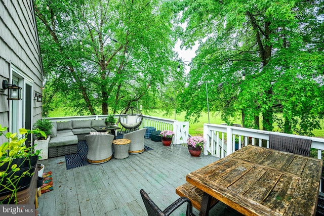 877 Salford Station Rd, Schwenksville, PA 19473 - wooden deck with an outdoor living space, outdoor dining space, and view of wooded area