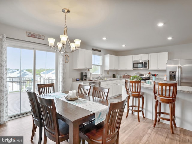 171 Cougill Rd, Middletown, VA 22645 - dining space featuring a chandelier, light wood-type flooring, and recessed lighting