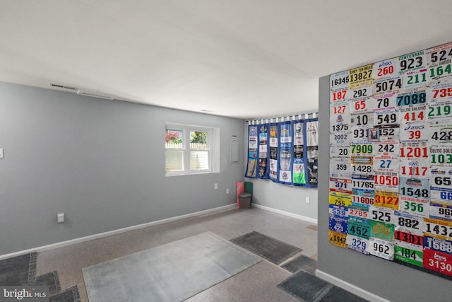 interior space featuring baseboards and visible vents