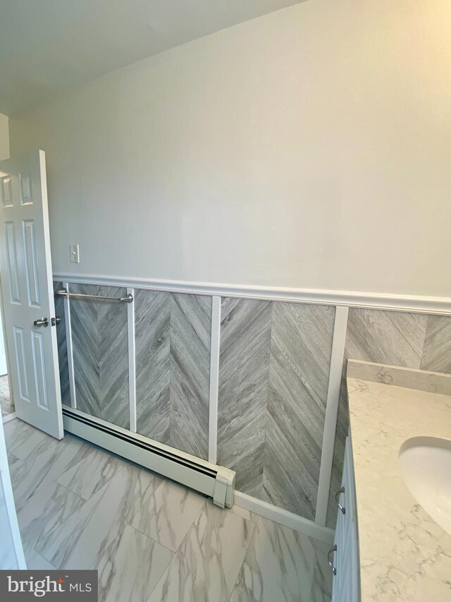 4901 Harbor Beach Blvd Unit P12, Brigantine, NJ 08203 - interior space featuring wainscoting, baseboard heating, and marble finish floor