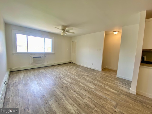 4901 Harbor Beach Blvd Unit P12, Brigantine, NJ 08203 - unfurnished room with baseboards, a ceiling fan, an AC wall unit, and wood finished floors