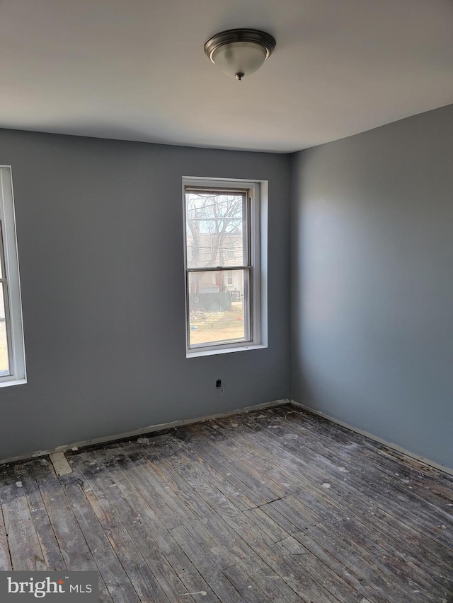 empty room featuring hardwood / wood-style flooring