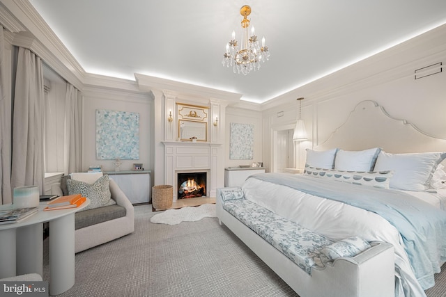 109 Duke St, Alexandria, VA 22314 - bedroom featuring a fireplace, a chandelier, and crown molding