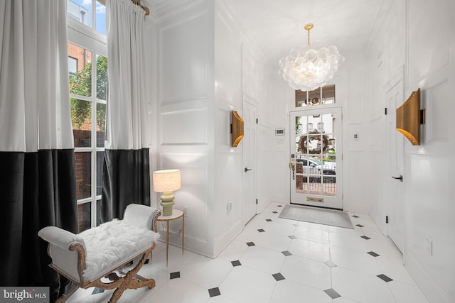 109 Duke St, Alexandria, VA 22314 - entrance foyer featuring a chandelier and crown molding