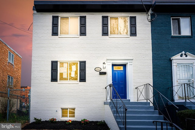 5505 Hayes St NE, Washington, DC 20019 - townhome / multi-family property with brick siding and fence