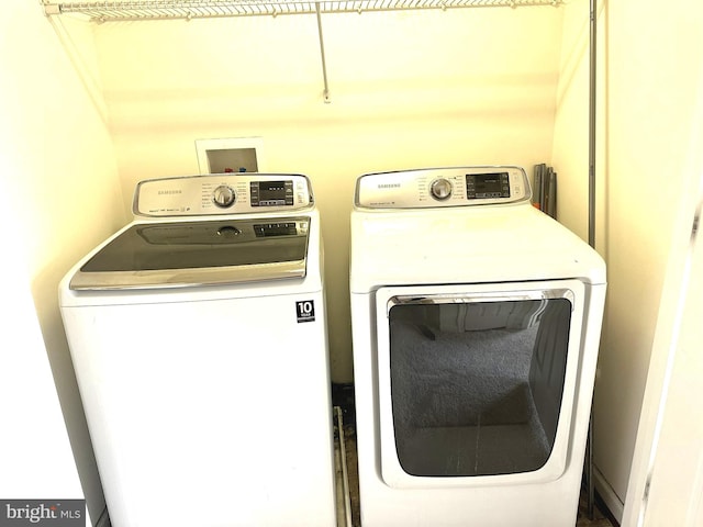 laundry area featuring washing machine and dryer
