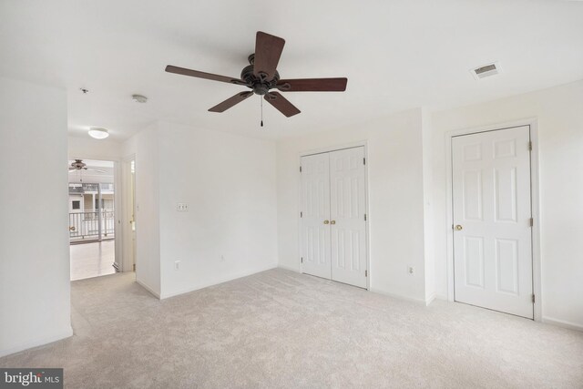 24764 Stone Station Ter, Aldie, VA 20105 - unfurnished living room featuring ceiling fan, carpet floors, and baseboards