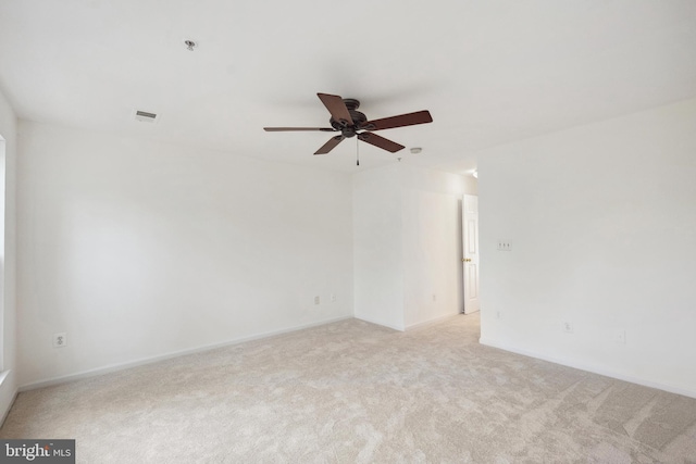 24764 Stone Station Ter, Aldie, VA 20105 - spare room with light colored carpet, ceiling fan, a pendent fire sprinkler, and baseboards