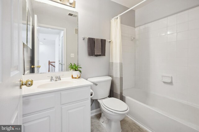 24764 Stone Station Ter, Aldie, VA 20105 - full bathroom with toilet, shower / bath combo, tile patterned flooring, vanity, and baseboards