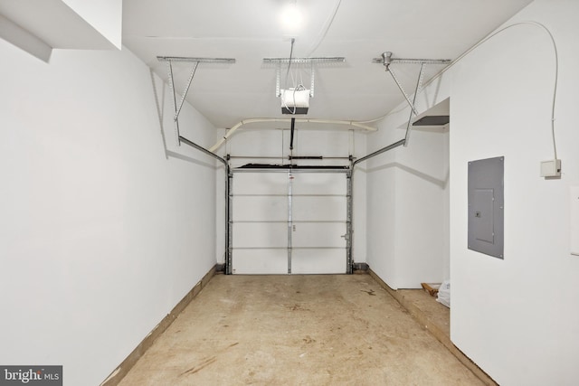 24764 Stone Station Ter, Aldie, VA 20105 - garage with electric panel, a garage door opener, and baseboards