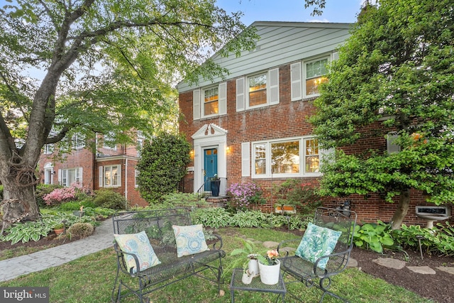 view of front of property with brick siding