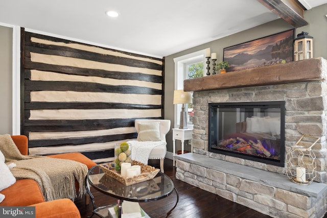 living area featuring wood-type flooring, recessed lighting, and a fireplace