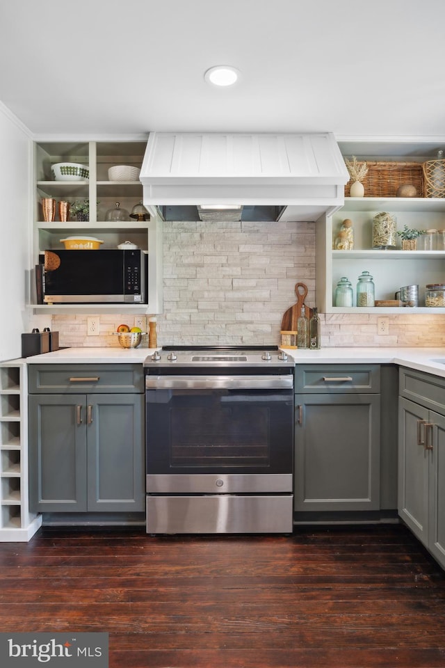kitchen with premium range hood, gray cabinets, open shelves, and stainless steel appliances