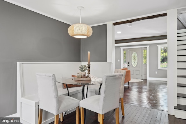 dining space with recessed lighting, baseboards, and hardwood / wood-style floors