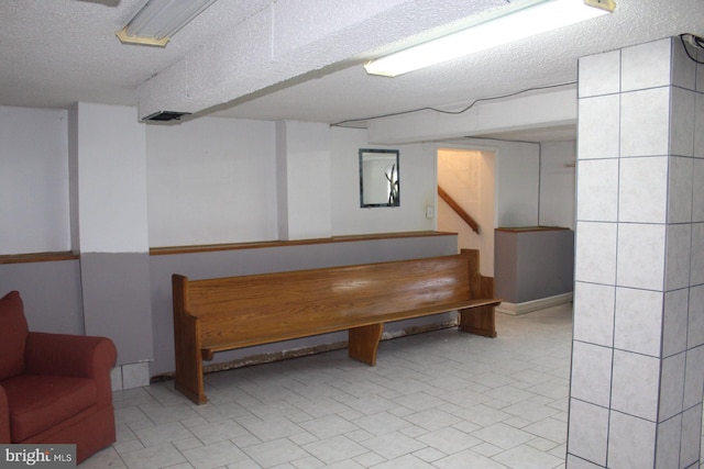 577 Winchester St, Paw Paw, WV 25434 - living area featuring a textured ceiling