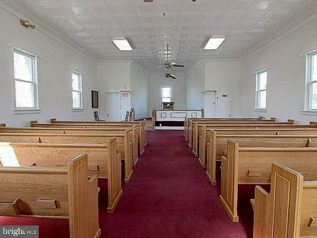 577 Winchester St, Paw Paw, WV 25434 - miscellaneous room featuring a ceiling fan, plenty of natural light, dark colored carpet, an ornate ceiling, and ornamental molding