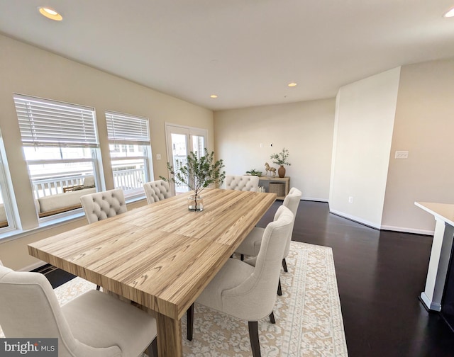 dining room featuring recessed lighting, baseboards, and dark wood finished floors