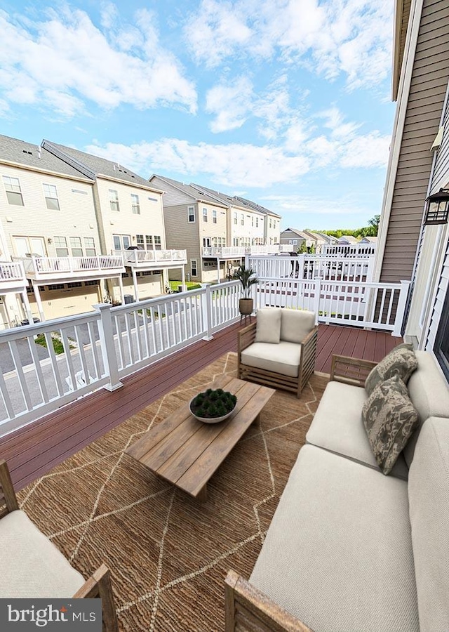 balcony with outdoor lounge area and a residential view