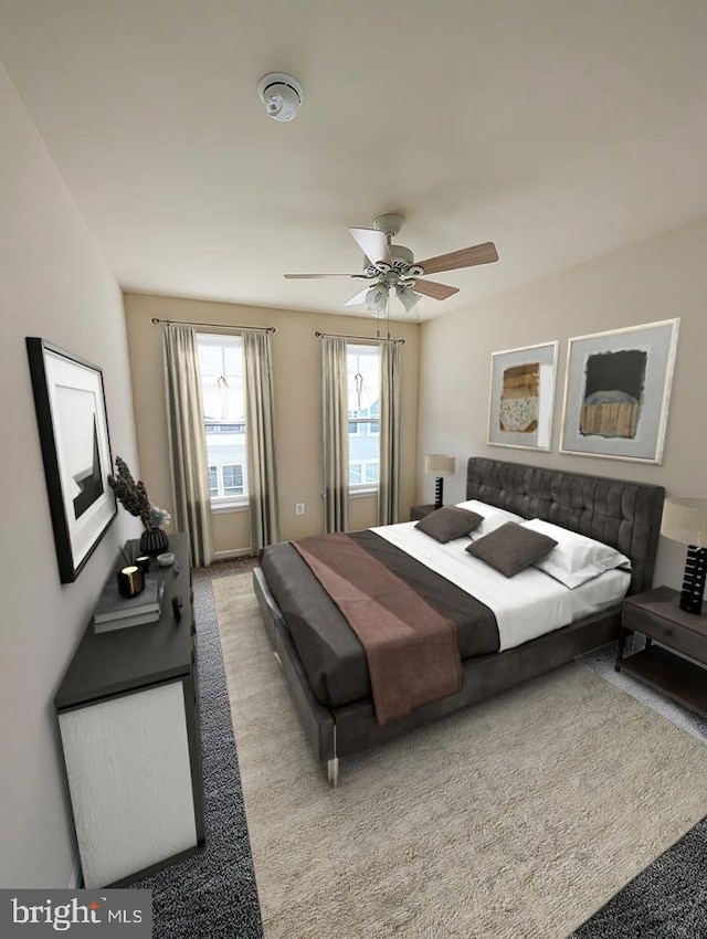 bedroom with carpet flooring and a ceiling fan