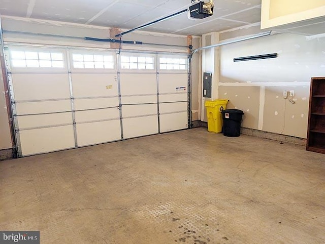 garage featuring a garage door opener and electric panel