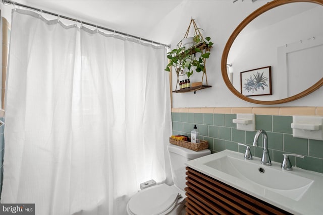 1705 N Cliff St, Alexandria, VA 22301 - full bath with tile walls, toilet, vanity, and a wainscoted wall
