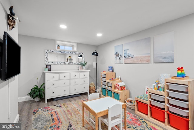 1705 N Cliff St, Alexandria, VA 22301 - game room featuring wood finished floors, recessed lighting, and baseboards