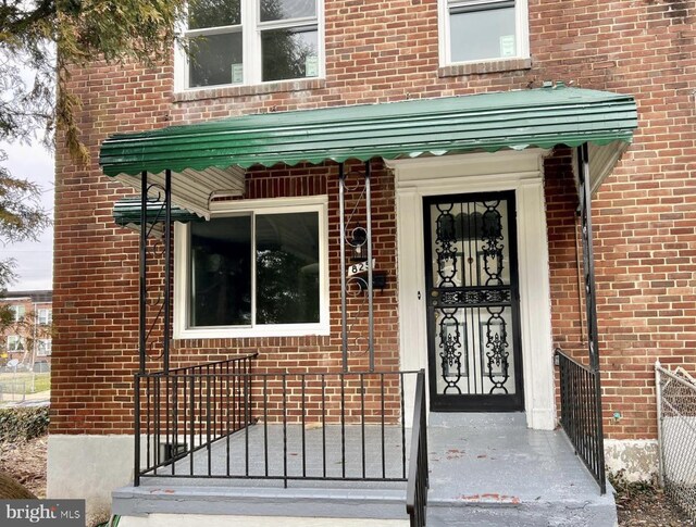 825 Wicklow Rd, Baltimore, MD 21229 - view of exterior entry with brick siding