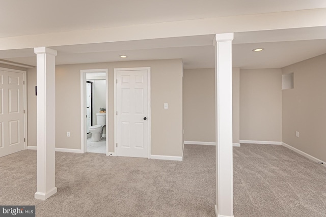 finished below grade area featuring recessed lighting, carpet, and baseboards