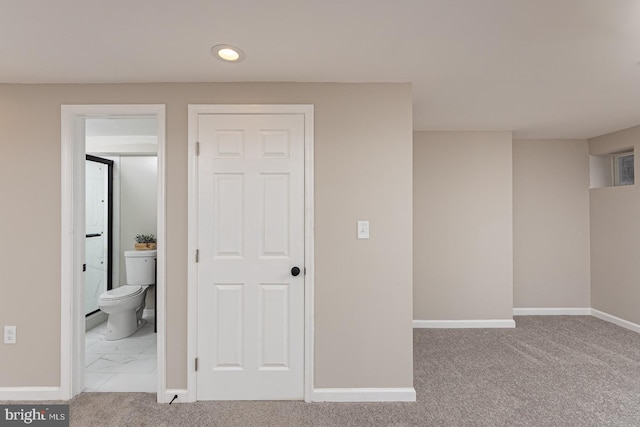 unfurnished bedroom with carpet floors, baseboards, recessed lighting, and connected bathroom