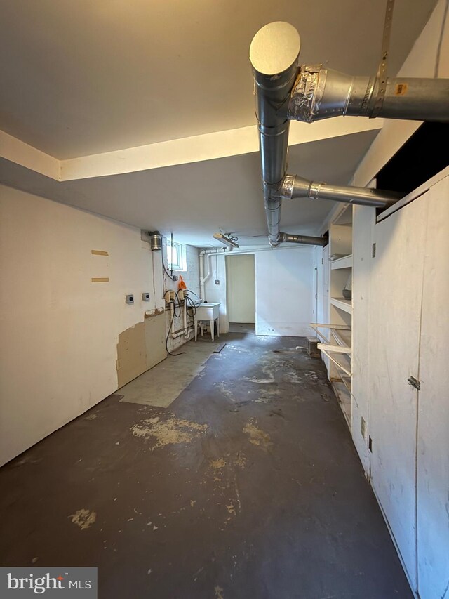 unfinished basement with a sink
