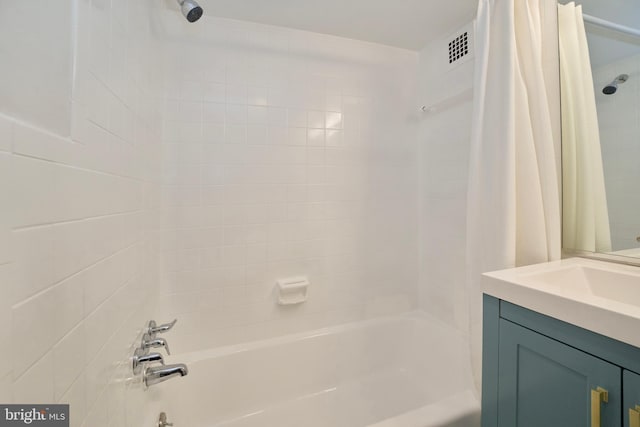 full bath featuring vanity, shower / bathtub combination with curtain, and visible vents