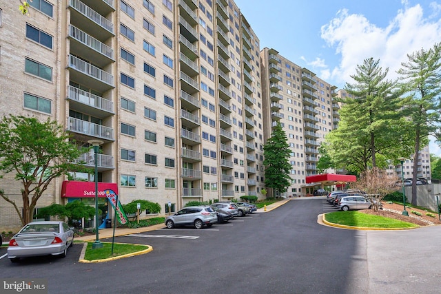 view of property with uncovered parking
