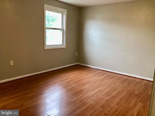 8317 Irongate Way, Manassas, VA 20109 - spare room with wood finished floors and baseboards