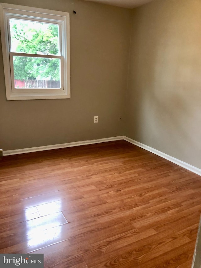 8317 Irongate Way, Manassas, VA 20109 - spare room featuring baseboards and wood finished floors