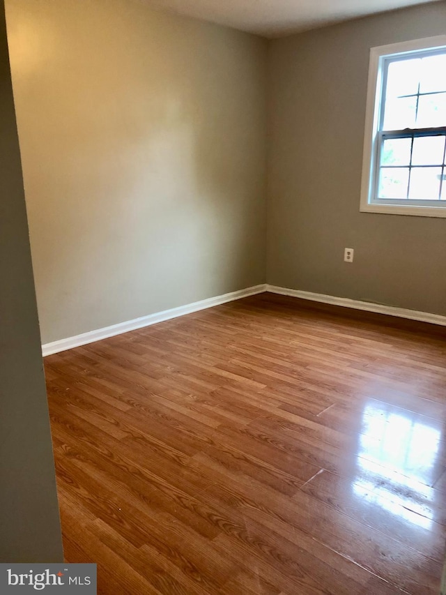 8317 Irongate Way, Manassas, VA 20109 - unfurnished room with wood finished floors and baseboards