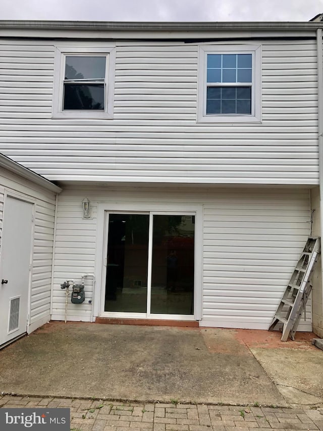 8317 Irongate Way, Manassas, VA 20109 - rear view of property featuring a patio area