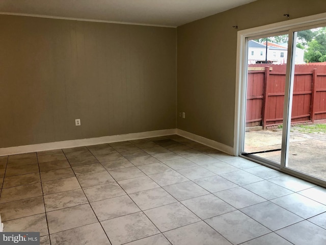 8317 Irongate Way, Manassas, VA 20109 - spare room with light tile patterned floors, baseboards, and crown molding