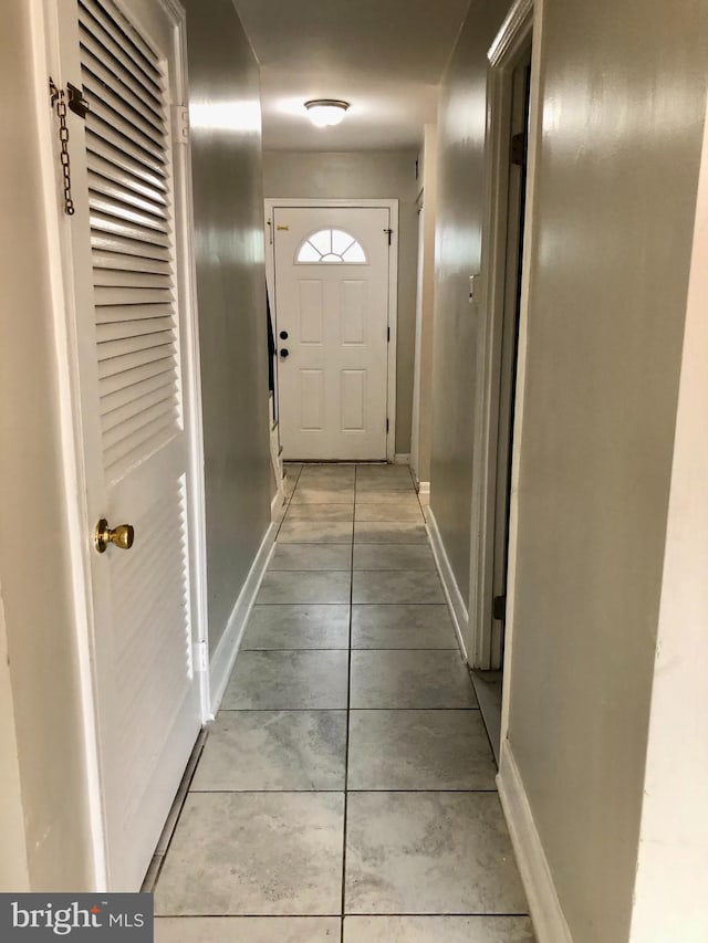 8317 Irongate Way, Manassas, VA 20109 - corridor with baseboards and light tile patterned floors