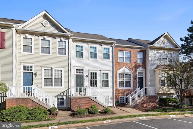 multi unit property featuring uncovered parking