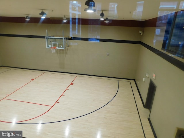 view of sport court featuring community basketball court