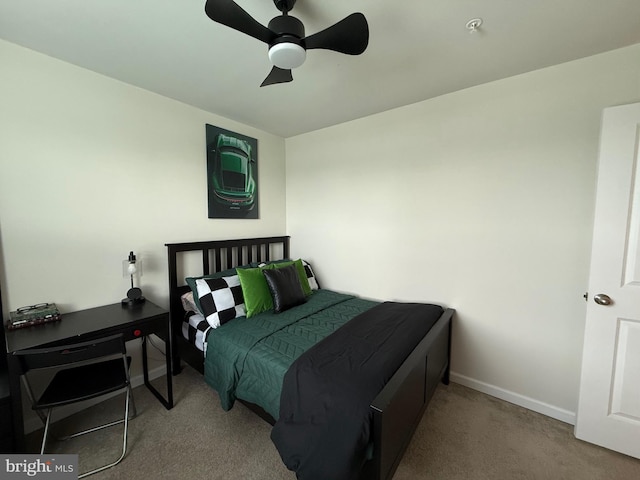 bedroom with baseboards, carpet, and ceiling fan
