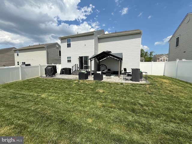 back of property with cooling unit, a fenced backyard, an outdoor hangout area, a gazebo, and a yard
