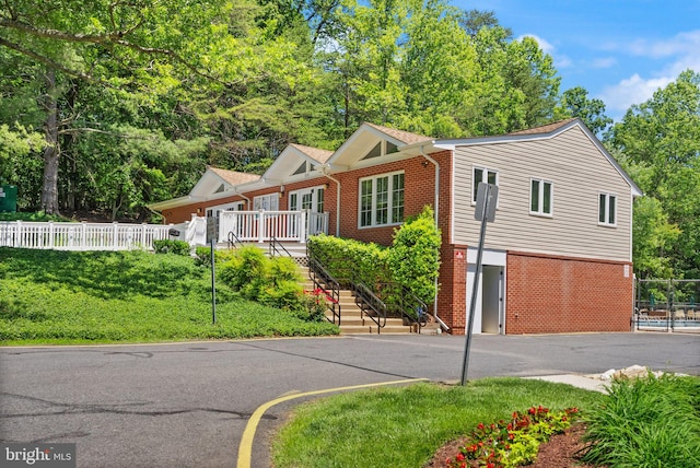 8337 Wind Fall Rd, Springfield, VA 22153 - view of front facade with brick siding and stairs