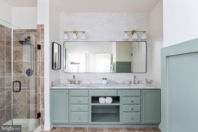 full bath featuring a stall shower and double vanity